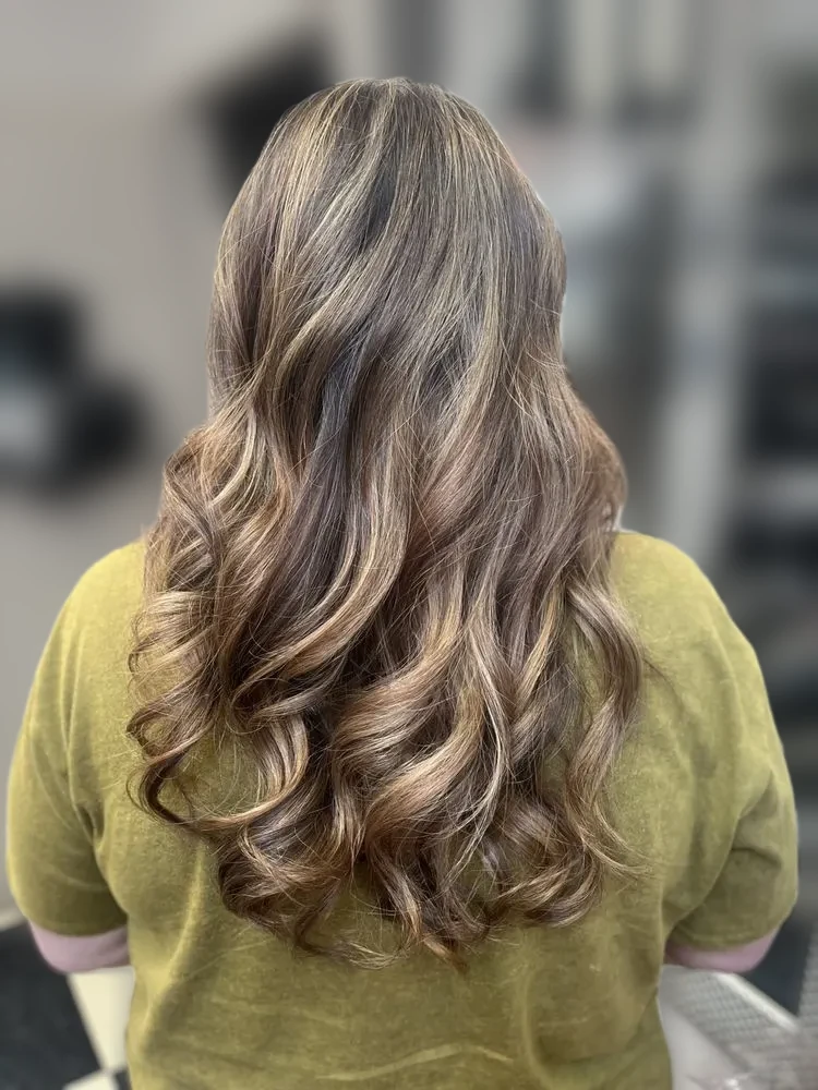 Caramel highlighted curls, back view