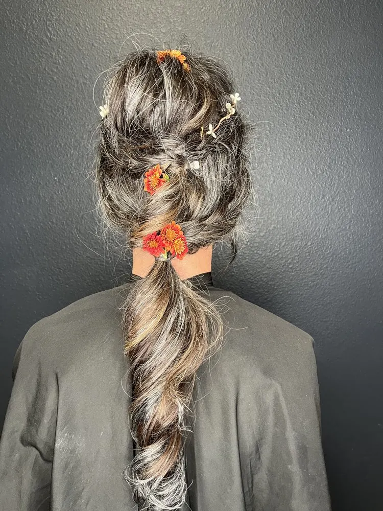 Flower-woven braid updo